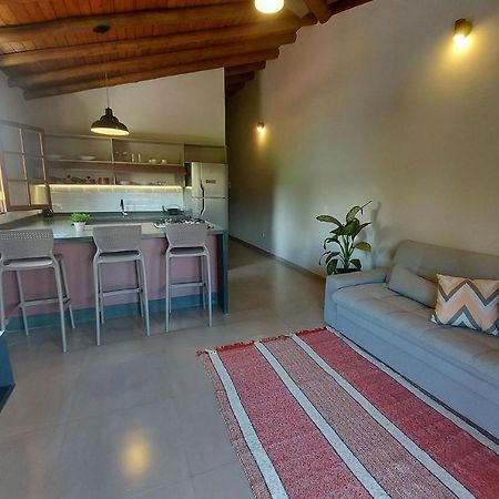 Sapeca - Novo Flat c/ piscina, 50mts da praia, churrasqueira privativa, ar con, wi-fi, netflix. 4pessoas, garagem Araquari Exterior foto